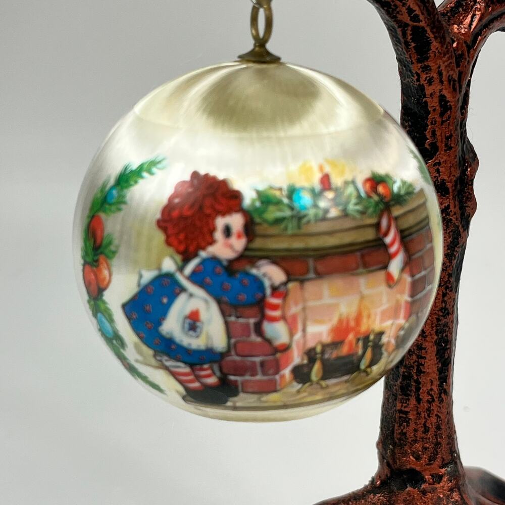 1976 Raggedy Ann Christmas Ornament Fireplace Scene Vintage Satin Ball 2.5"